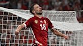Hungary ease to win as Swiss draw