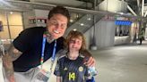 Scotland star Lyndon Dykes' sweet gesture for young fan in tears in the stands