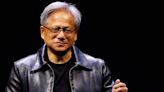 Nvidia's Jensen Huang sheds his biker chic look to dance in a red floral vest during a visit to China