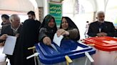 Iran votes for its new president amid economic strife, crackdowns and regional war