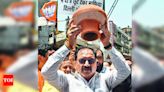 BJP holds water protests across capital, AAP alleges vandalism | Delhi News - Times of India