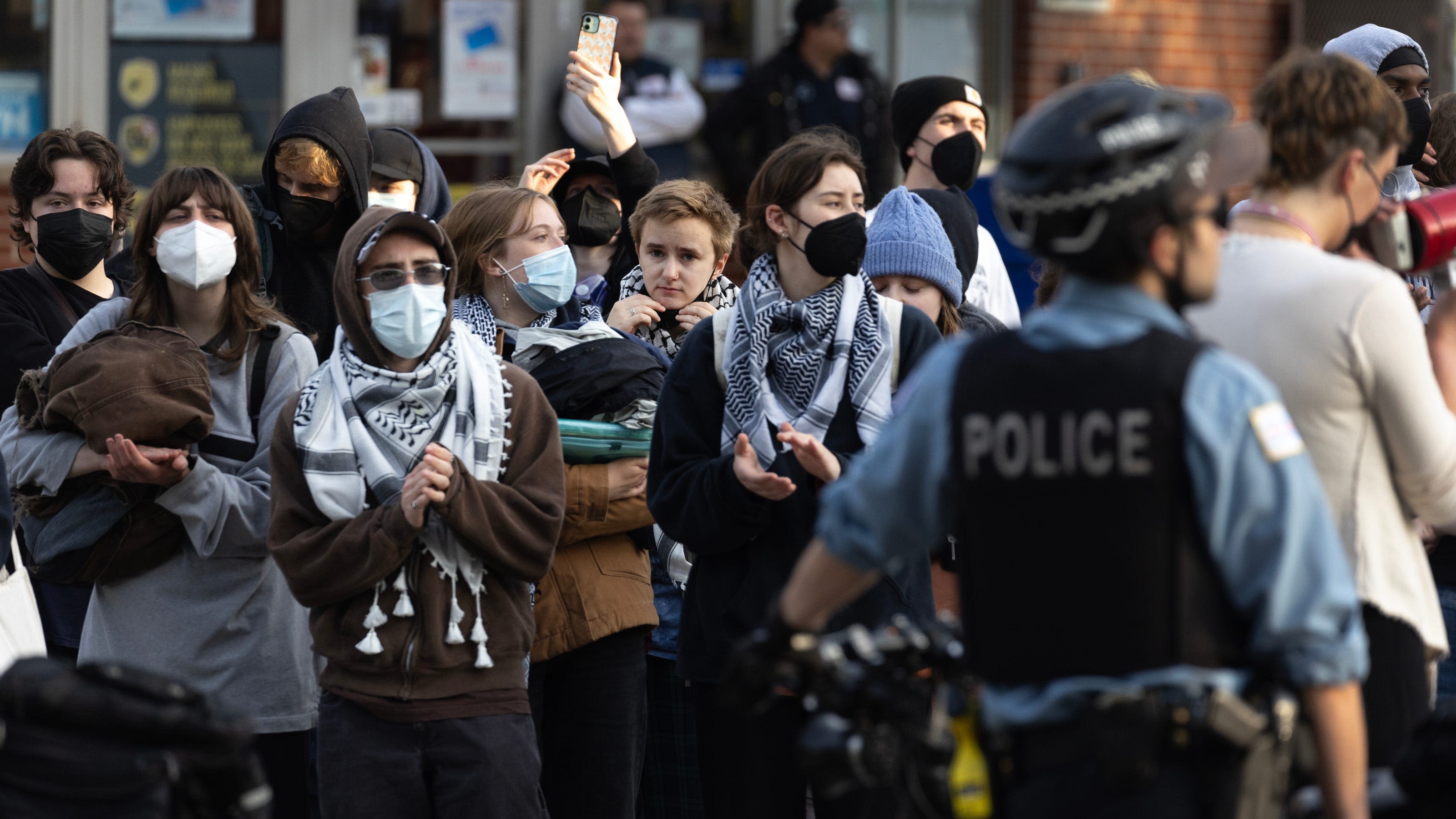 Masks are key tool against COVID-19. Should they be banned for war protesters?