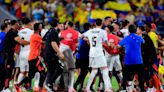 Brawl breaks out between players and fans after Colombia-Uruguay soccer match