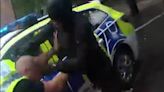 Shocking moment knifeman stabs police officer in the neck