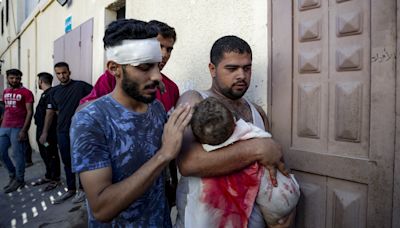 A Gaza father mourns his baby boy, killed in bed by an Israeli airstrike