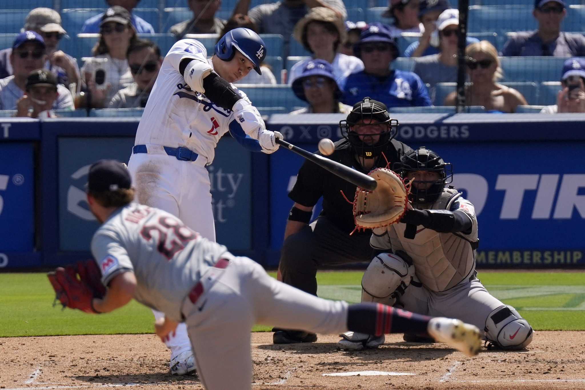 Ohtani hits 46th homer to tie career high, Dodgers beat Guardians 4-0 in record-tying heat