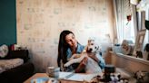 Puppy's cuddles with owner at work melt hearts—"she just gets me"