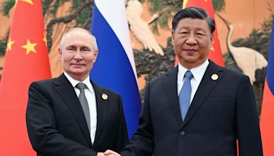 Putin Visits Ally Xi as US Threatens China Sanctions Over Ties