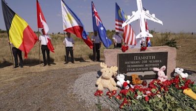 MH17 victims honoured at Ukraine crash site memorial 10 years on as Moscow denies responsibility