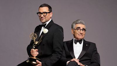 Dan Levy recalls playing with dad Eugene's 'decaying Emmy Awards' as a child