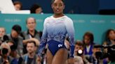 A slip on the balance beam and penalties on the floor cost Simone Biles another gold medal