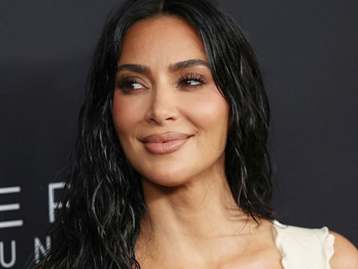 Kim Kardashian Showed Off Her Cleavage In A Plunging $98 Bodysuit