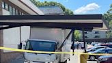 Crews respond to a truck crash into the awning of a building on School Street | ABC6