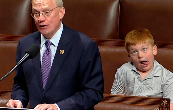 Congressman's son steals the show making silly faces behind dad during speech on the House floor