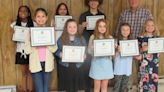 Bedington Ruritan Club celebrates poster and essay contest winners at dinner on May 15