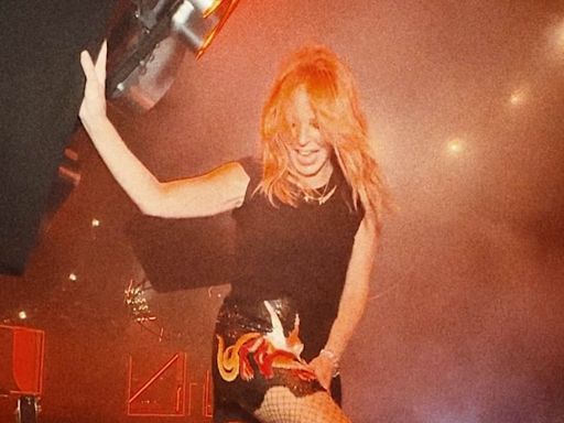 Kylie Minogue dances on tables during wild night out in Ibiza