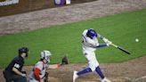 Deadspin | Cubs outlast Reds on long, rainy night at Wrigley