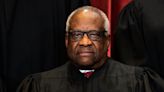 Clarence Thomas discloses two paid vacations