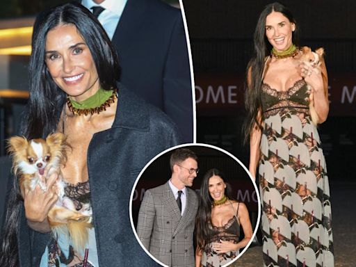 Demi Moore stuns in sheer dress at Gucci fashion show — with Pilaf the Chihuahua, of course
