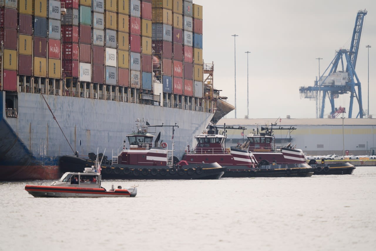 Tugboats escort ship that caused deadly Baltimore bridge collapse back to port