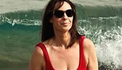 ‘Look at her Baywatch body!’ gush The One Show fans as Alex Jones, 47, strips to red swimsuit for sizzling beach snap