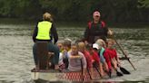 Breast cancer survivors compete together on 'Against the Wind' at Independence Dragon Boat Regatta