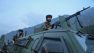 Indian troops battle gunmen in Kashmir, several wounded