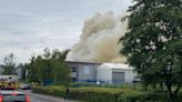 Smoke pours from industrial unit fire