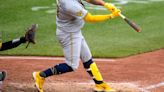 Brewers beat Pirates 7-5 to earn series split