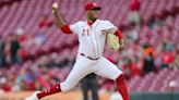 Greene retires 20 straight in rain-shortened win for Reds