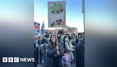 Teacher cleared by court for coconut placard at rally