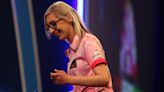 Fallon Sherrock becomes first woman to hit nine-dart finish in PDC event