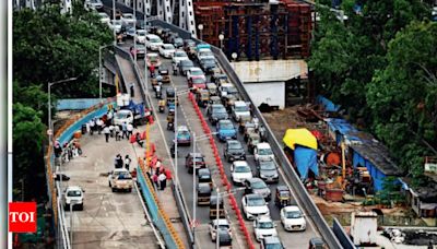 Mumbai's Barfiwala flyover opened for traffic, no one knows who did it | Mumbai News - Times of India