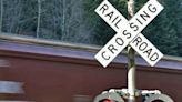 Ford F-150 hit by train at railroad crossing in Talladega County; 20-year-old woman killed