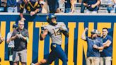 WVU Dominates Towson 65-7 in Much Needed Win