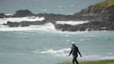 Kitayama leads Pebble Beach as the worst of the wind looms