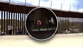 Migrants crossing illegally into California snap photos at border wall
