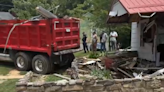 Dump truck drives into Mercer County home