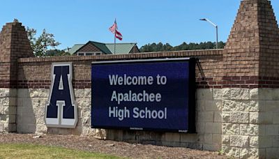 Shooter kills 4 at a Georgia high school and a suspect is in custody, officials say