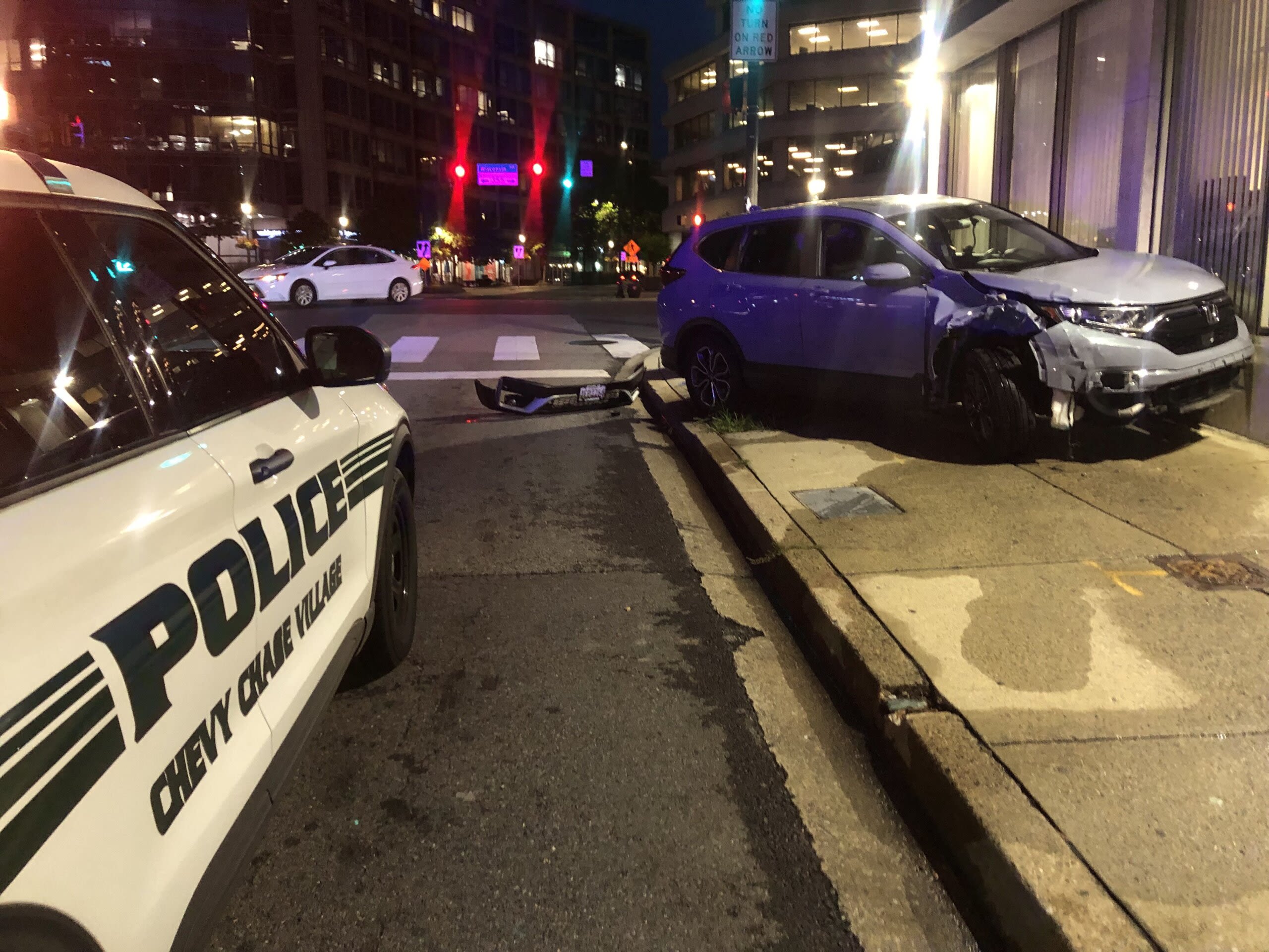 Car crashes into Friendship Heights bank, 2 other cars, before driver flees on foot - WTOP News