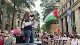 Sereen Haddad speaks during a pro-Palestine march
