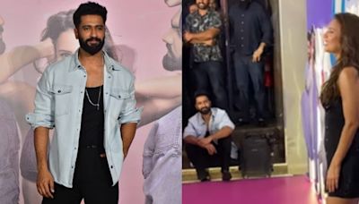 Vicky Kaushal sits on the stairs and waits patiently as Triptii Dimri is clicked; fans call him ‘humble’. Watch