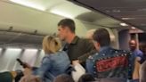 Man snatches woman’s phone and tries to make a call with it as he’s being kicked off flight