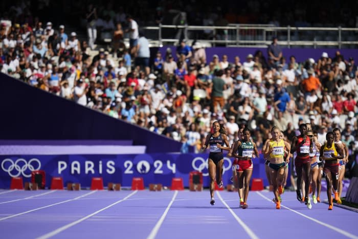 Kipyegon puts drama from night before behind her, starts quest for 3rd straight 1,500 Olympic title