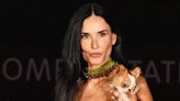 Demi Moore Dons Lace Slip Dress and Accessorizes With Pup Pilaf at Gucci Cruise Fashion Show