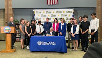 Ohio Gov. Mike DeWine signs legislation to limit cellphones in schools