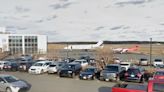 Police arrest 20 climate activists protesting at airport in Mass.