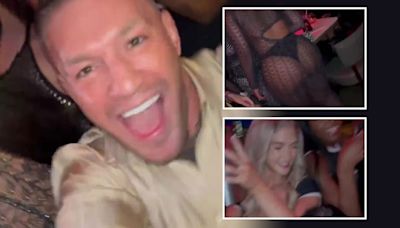 McGregor parties AGAIN with army of ring girls just weeks before UFC return