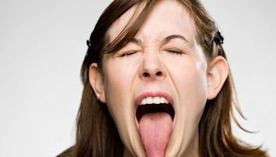 The red flag warning signs on your tongue that should trigger 'alarm bells'