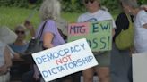 Charlottesville protestors gather before John McGuire and Marjorie Taylor Greene rally